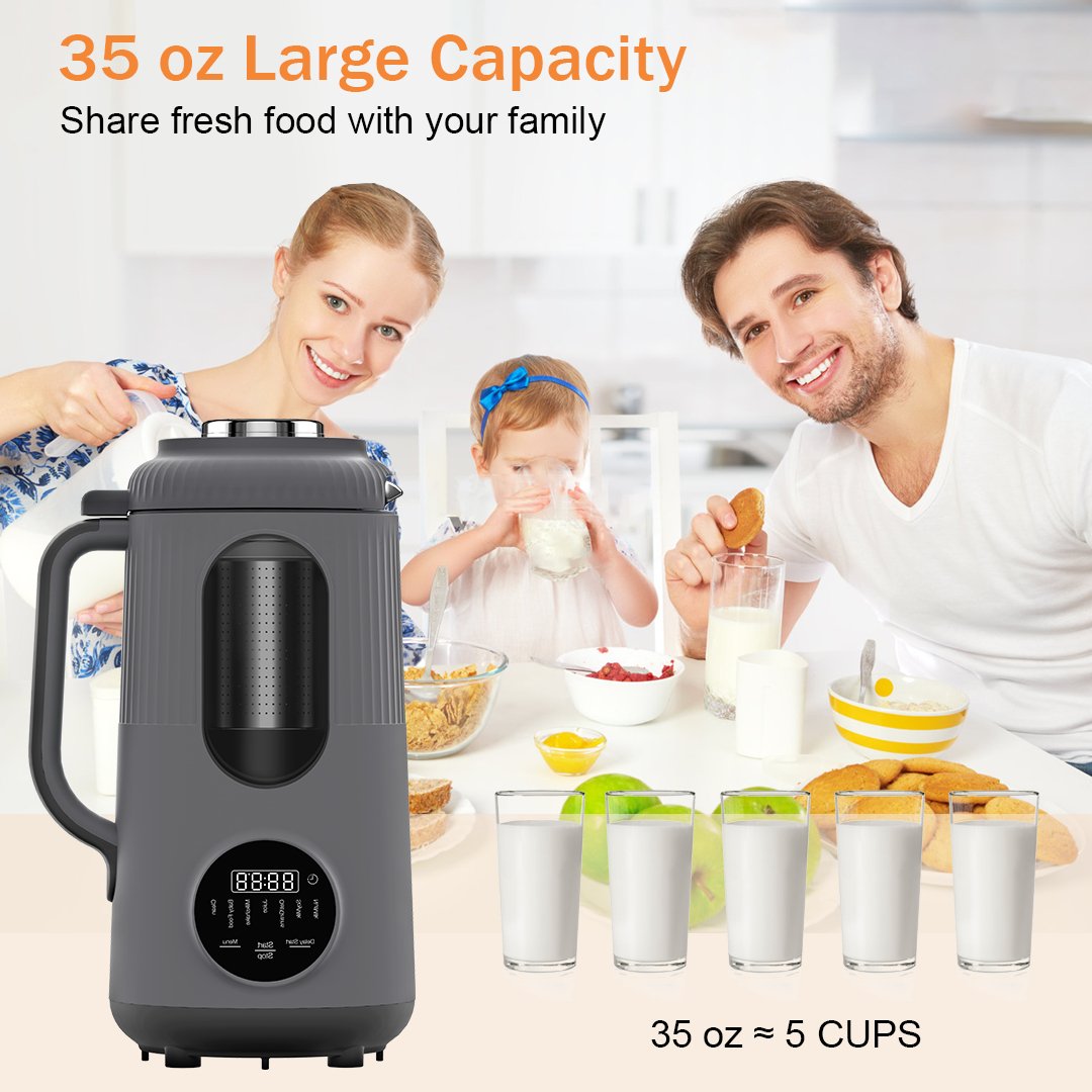 Happy family with a child sharing glasses of healthy homemade milk made by the blender and juicer machine.