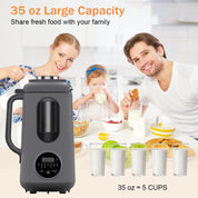 Happy family with a child sharing glasses of healthy homemade milk made by the blender and juicer machine.